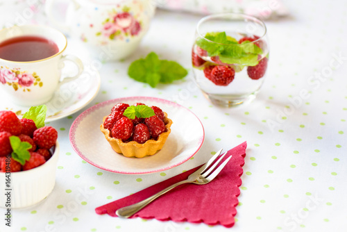Mini tart with raspberries fruits