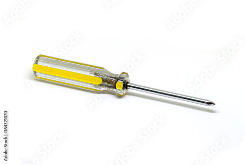 Screwdriver on white background. Metallic hand tool for homework or simple job.