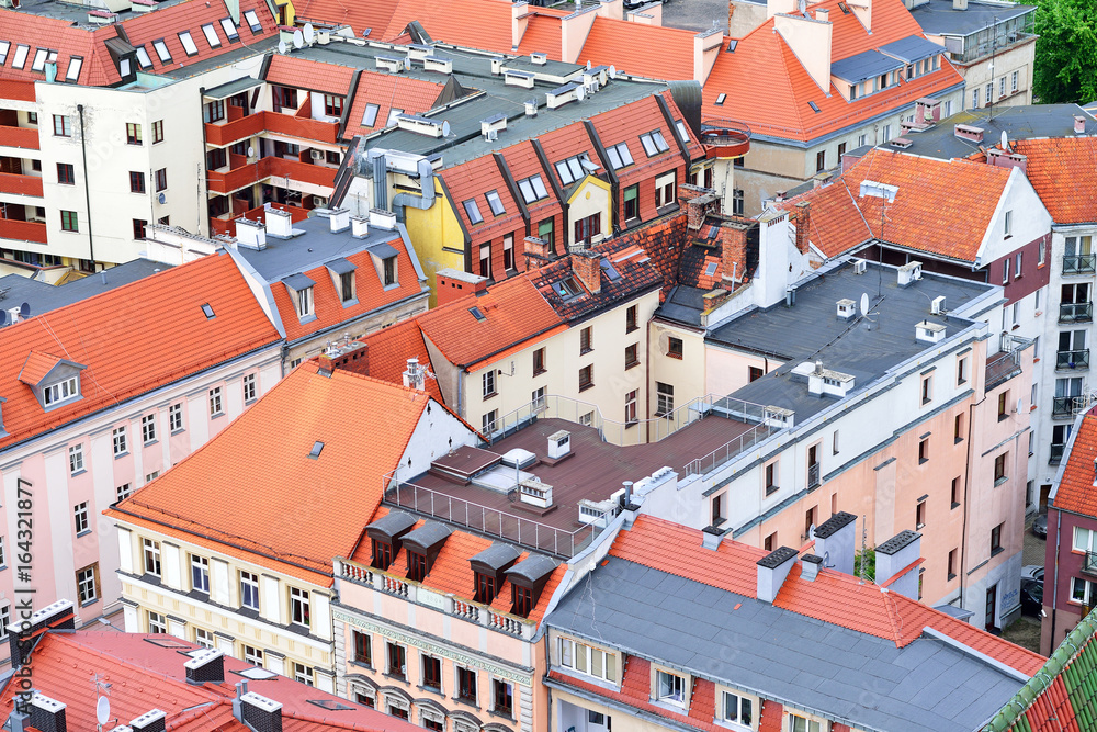 Tiled roofs in the residential area of the European city. Poland, Wroclaw.