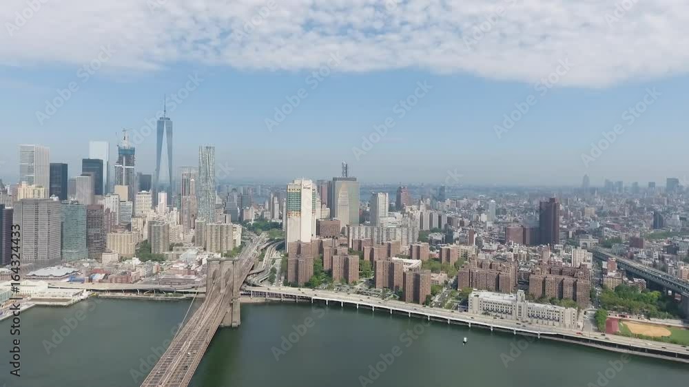 NEW YORK CITY SKYLINE BROOKLYN BRIDGE EAST RIVER AERIAL 4K