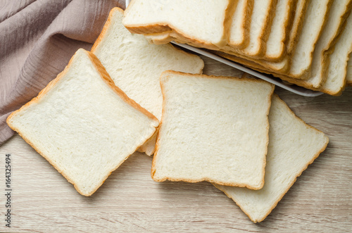 White bread on wood table for morning breakfast