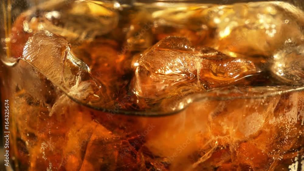 High quality video of cold drink with ice cubes in 4K High quality video of cold drink with ice cubes in 4K