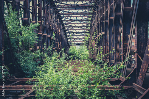 abandoned steel bridge - rusted steel beam construction