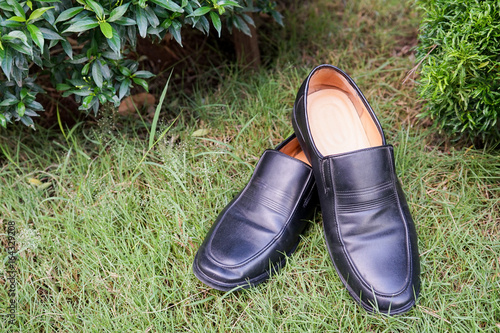 Groom shoes on the grass