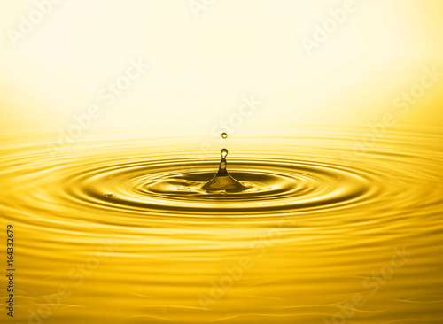 Close up of golden water drop