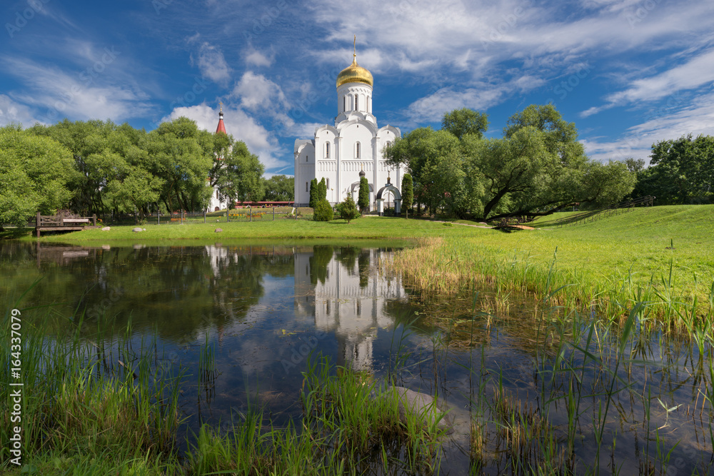 Minsk, Belarus. Church of the Intercession of the Theotokos (Holy Protection Orthodox Parish), Scenic View At View At Sunny Day.Holy Protection Cathedral in Minsk. Landscape With Church And Cloudy Sky