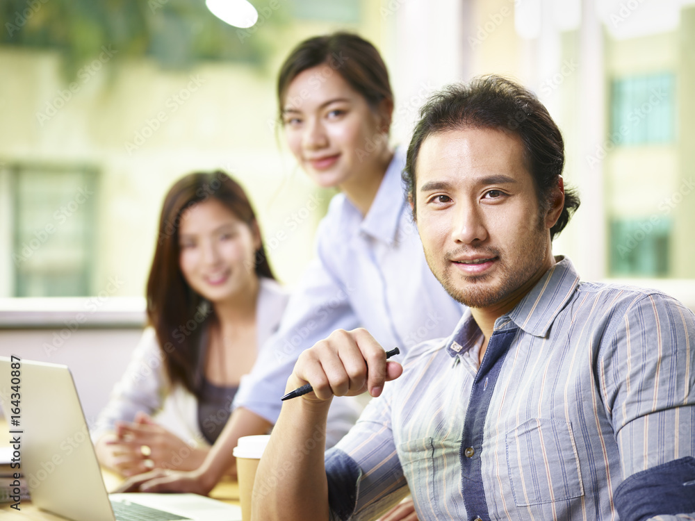 asian business man working in office asian business man working in office