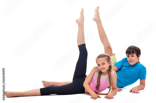 Kids doing gymnastic exercise - isolated