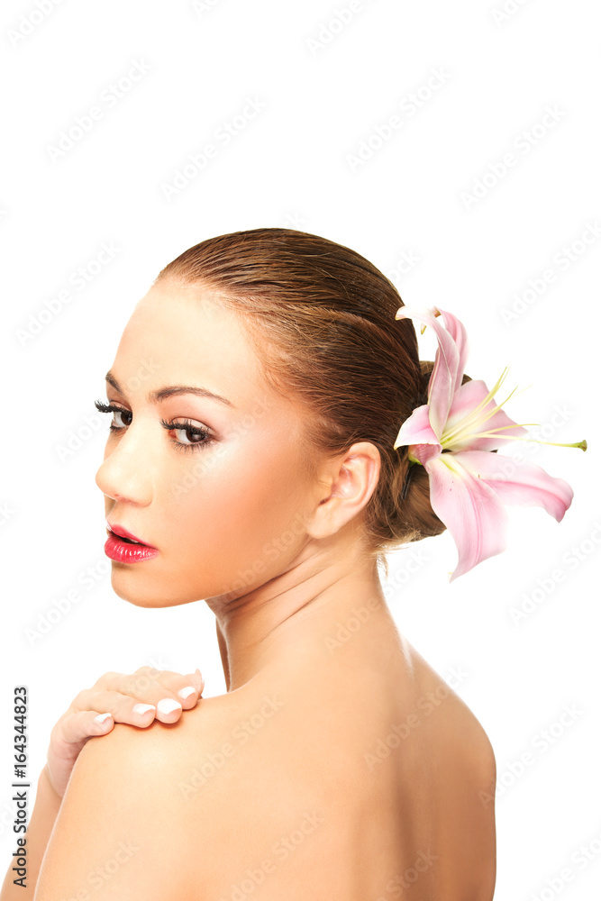 Fototapeta premium Beautiful spa woman with lily.