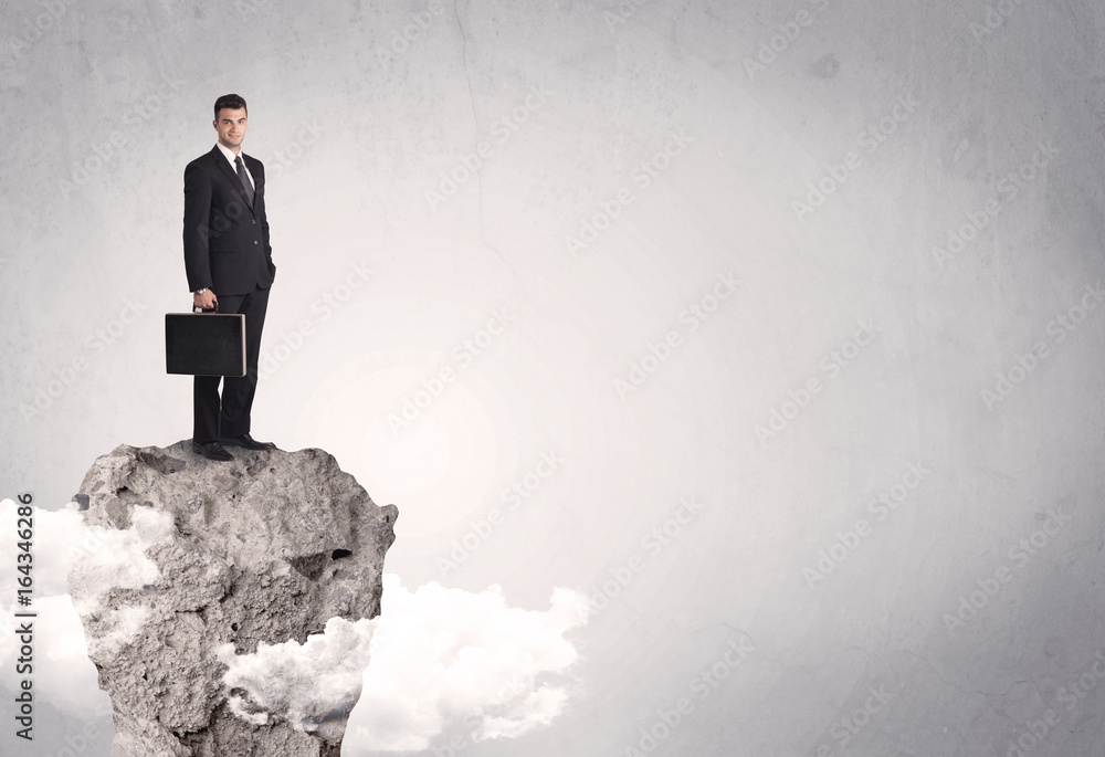 Best salesman on cliff in clear space Best salesman on cliff in clear space