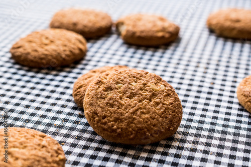 Anzac Biscuits on tablecloth.