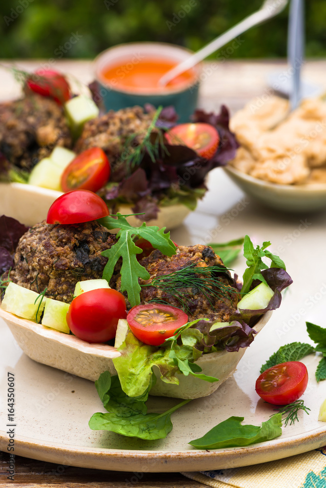 Mediterranean beef meatballs with salad in taco shells Mediterranean beef meatballs with salad in taco shells