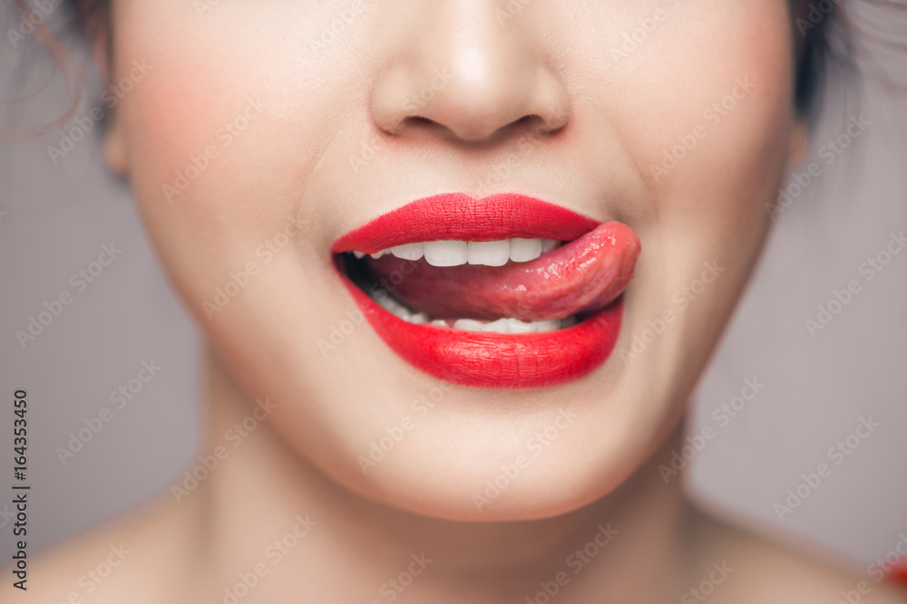 Obraz premium Red Sexy Lips closeup. Make up concept. Beautiful Perfect Lips.