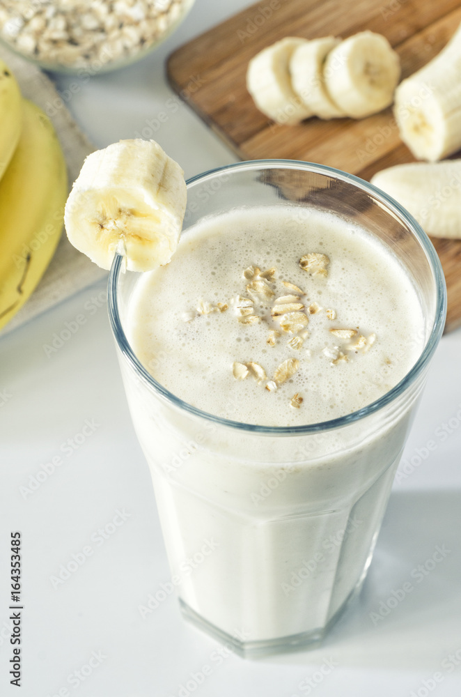 Milkshake with banana and oatmeal , healthy breakfast Milkshake with banana and oatmeal , healthy breakfast