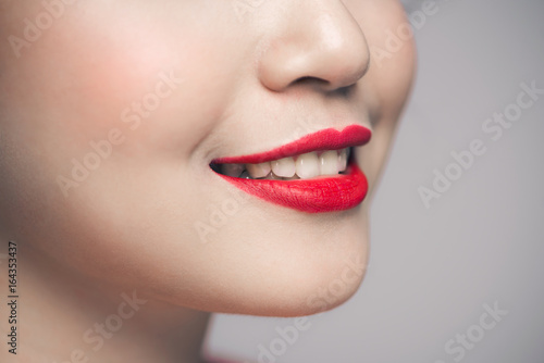 Red Sexy Lips closeup. Make up concept. Beautiful Perfect Lips.