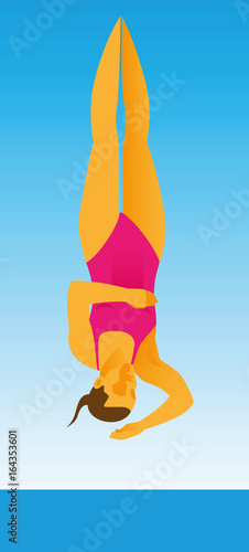 Young woman athlete performs a difficult diving jump in the water