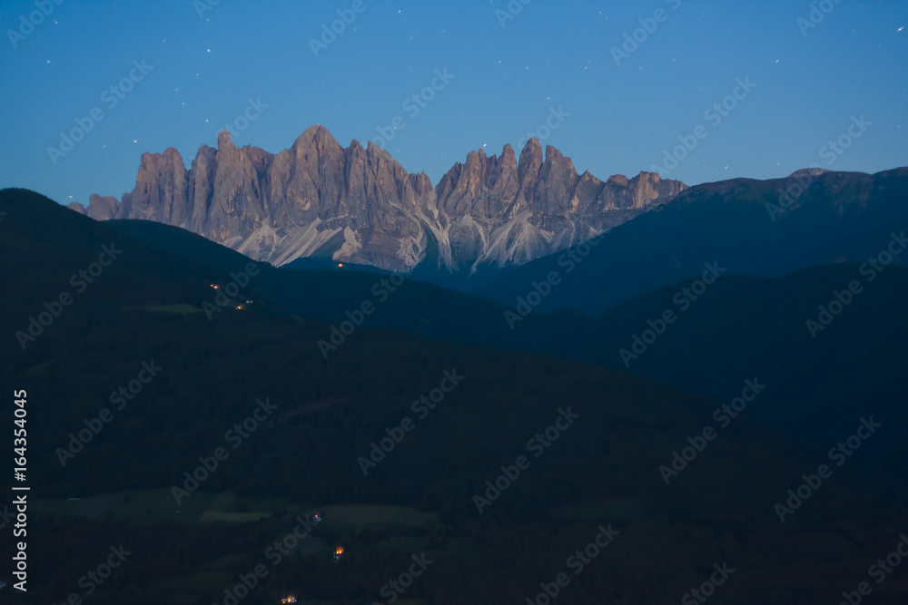 night scene of Dolomites Alps, val di Funes in background