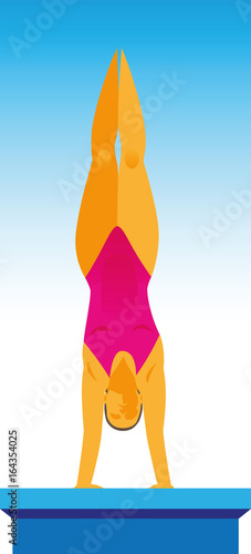 A young woman is a jumper in the water, which performs a jump from the rack on her hands