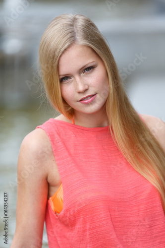 Canvastavla Romantic cute and young blonde girl looking at camera