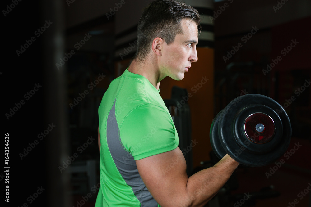 Portrait Of A Physically Fit Man In Modern Fitness Center Portrait Of A Physically Fit Man In Modern Fitness Center