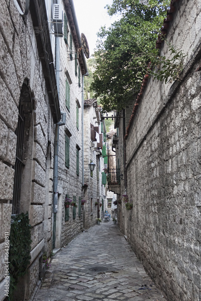 Narrow streets of the old city of Kotor always attract tourists