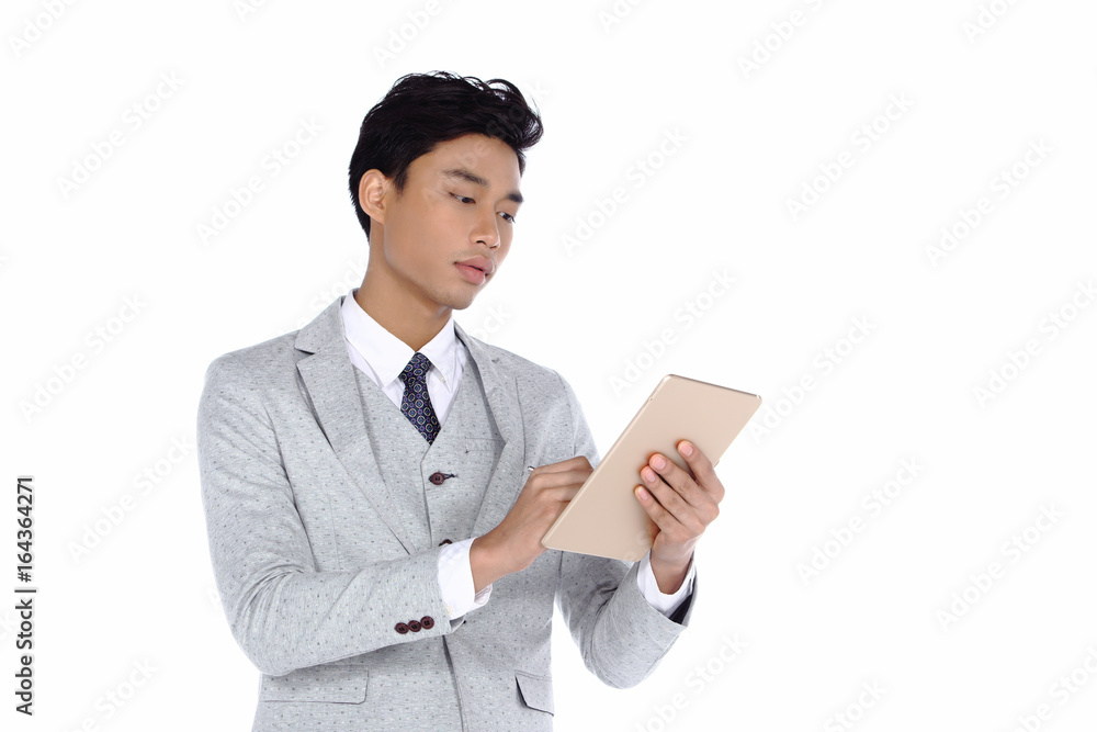 Gray Dot Suit Pant Businessman, Tan skin man half body sign digital signature on million dollar contract tablet, new technology, studio lighting white background isolated copy space Gray Dot Suit Pant Businessman, Tan skin man half body sign digital signature on million dollar contract tablet, new technology, studio lighting white background isolated copy space