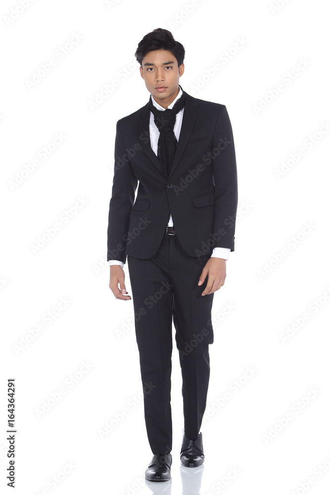 Asian Look Tan Skin Business Man in Black Suit Pant Shoe necktie, studio lighting white background isolated, walk action fashion pose Asian Look Tan Skin Business Man in Black Suit Pant Shoe necktie, studio lighting white background isolated, walk action fashion pose