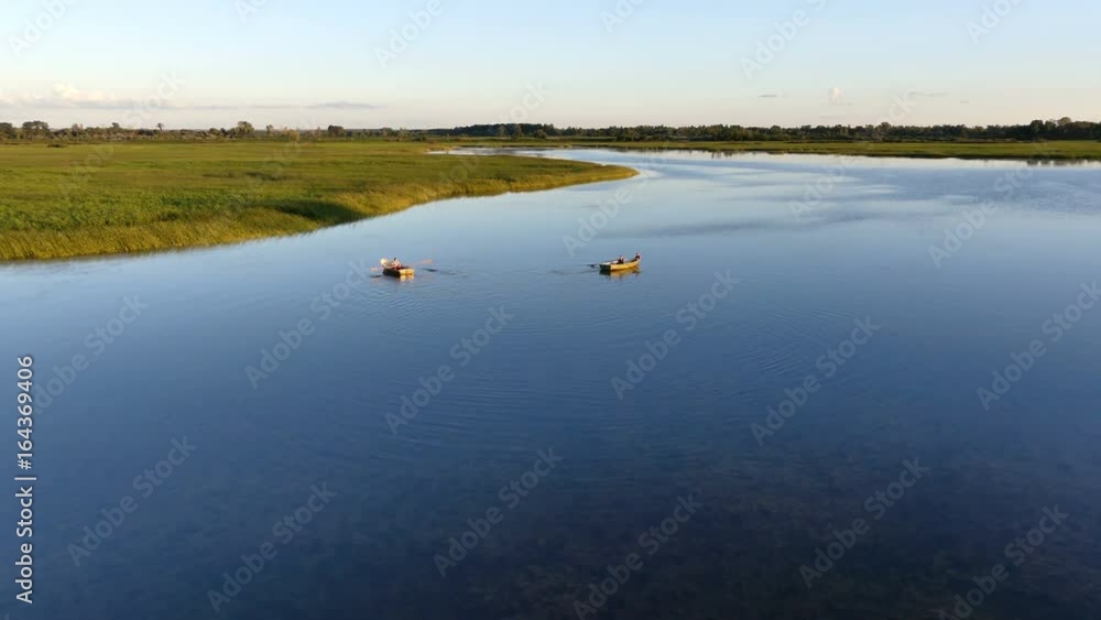 Boats float on the Lake