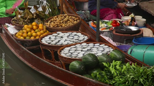 Fruits and vegetables were sold on boat the Damnoen saduak floating market is famous in Thailand