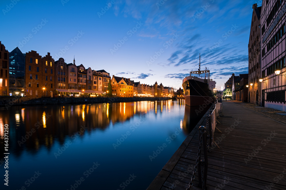 View of the old city of Gdańsk and the Motlawa River at night