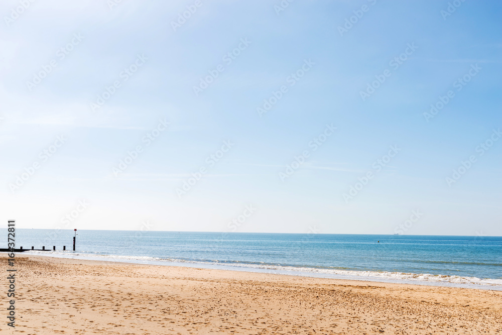 Sandy beach and blue ocean, beautiful sunny day, place of rest