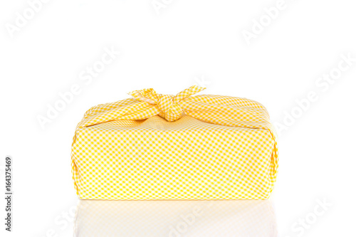 Yellow wrapped box.