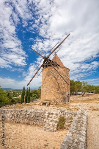 Old stone windmill in Saint Saturnin les Apt, Provence, France