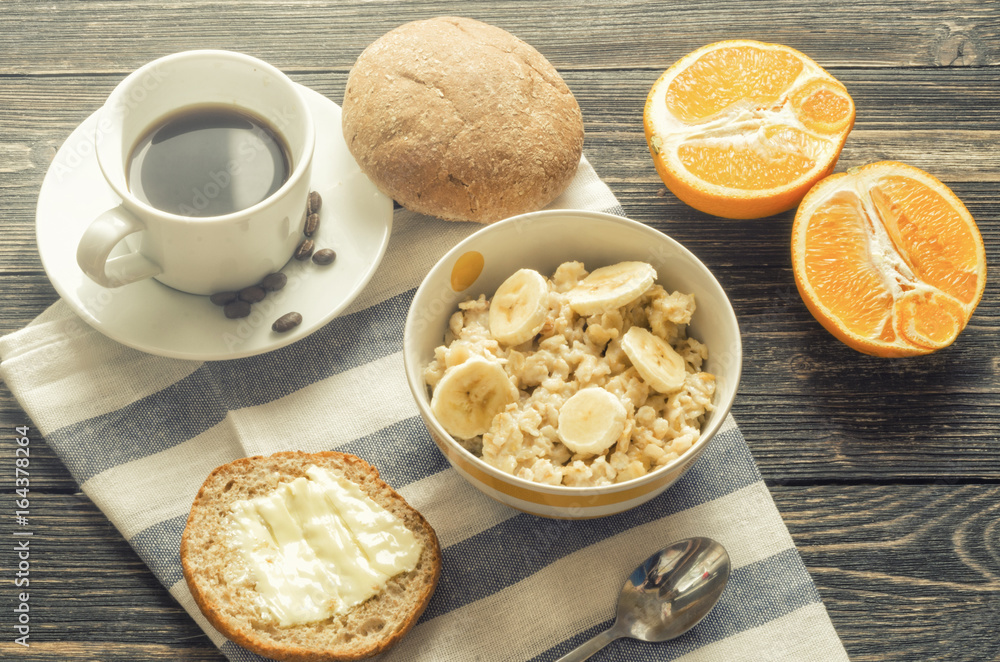 Bowl of homemade oatmeal porridge with banana, hot and healthy food for breakfast Bowl of homemade oatmeal porridge with banana, hot and healthy food for breakfast