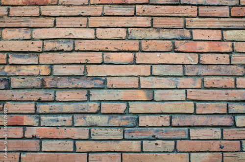 Old brown bricks wall texture and background
