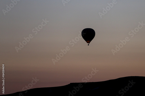 Hot Air Balloon Over Goreme Town © EvrenKalinbacak