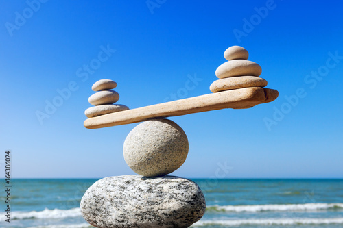 Canvas Print Concept of harmony and balance. Balance stones against the sea.
