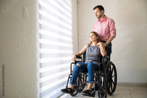 Woman in wheelchair getting some comfort
