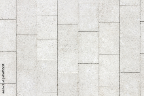 Floor of white stone slabs