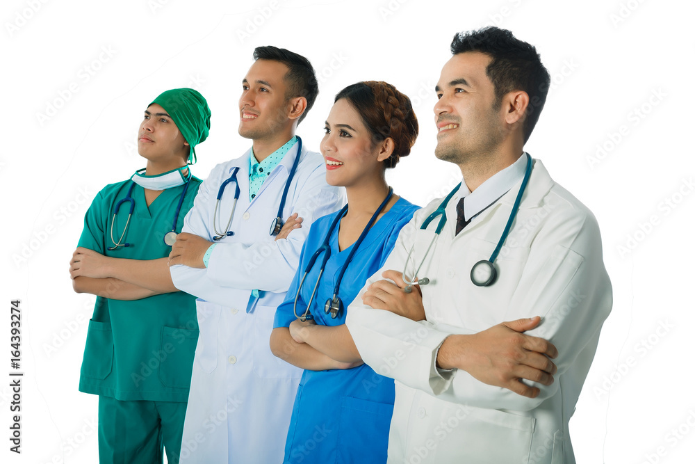 Doctors and nurses standing arms crossed together at hospital is professional, team looking up on the same time, concept motivation and teamwork, isolated on white background. Doctors and nurses standing arms crossed together at hospital is professional, team looking up on the same time, concept motivation and teamwork, isolated on white background.