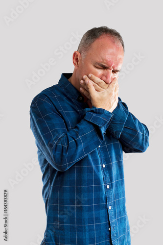 Mature man with toothache