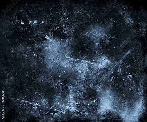 Dark blue scratched metal grunge texture background