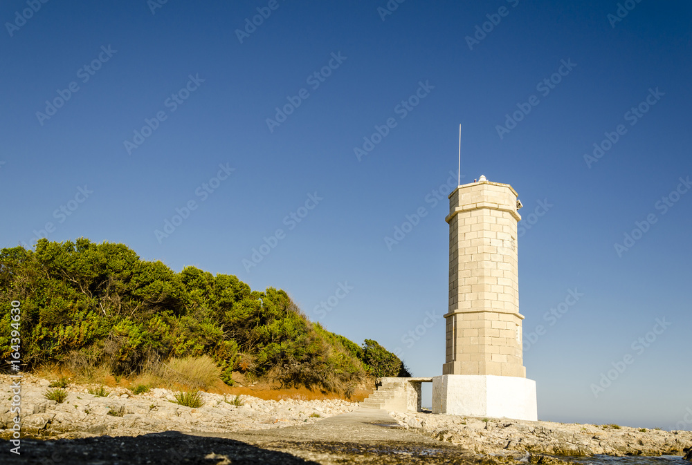 lighthouse at sunset, dalmatia, croatia