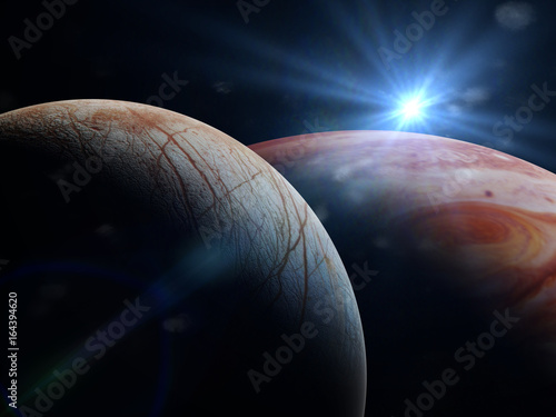 Fototapeta Naklejka Na Ścianę i Meble -  Jupiter's moon Europa in front of the planet Jupiter 