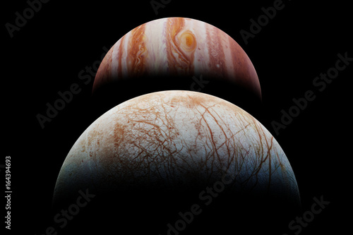 Fototapeta Naklejka Na Ścianę i Meble -  Jupiter's moon Europa in front of the planet Jupiter and the Milky Way