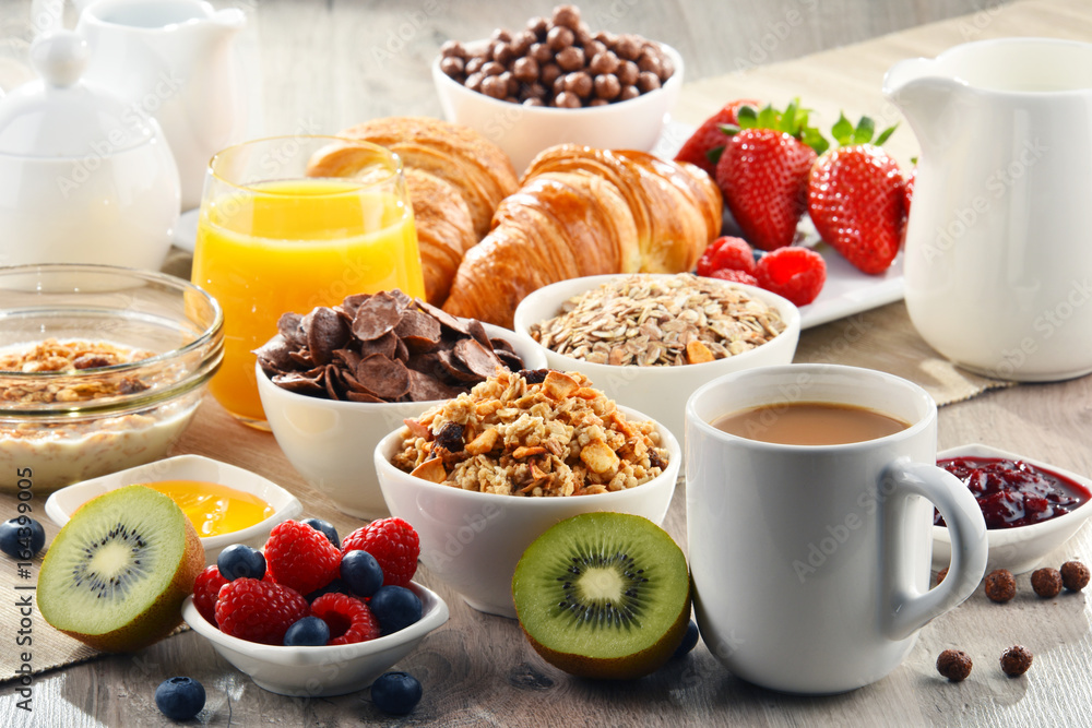 Breakfast served with coffee, juice, croissants and fruits Breakfast served with coffee, juice, croissants and fruits