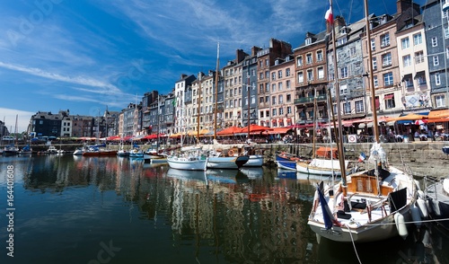 Editorial Honfleur, France - July 05, 2017: Honfleur harbour in France's Normandy region, sited on the estuary where the Seine river meets the English Channel © leighton collins