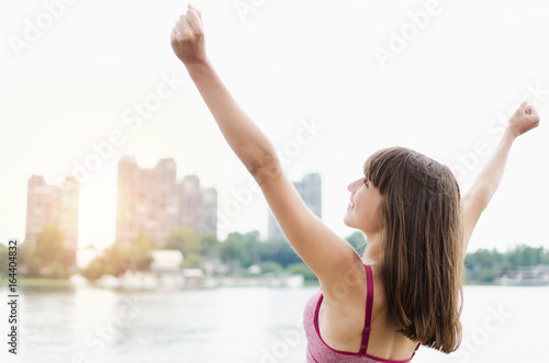 raised hands of female