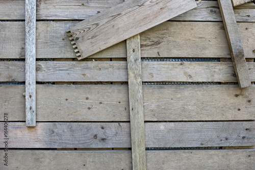 Industrial background of wooden boards with nails