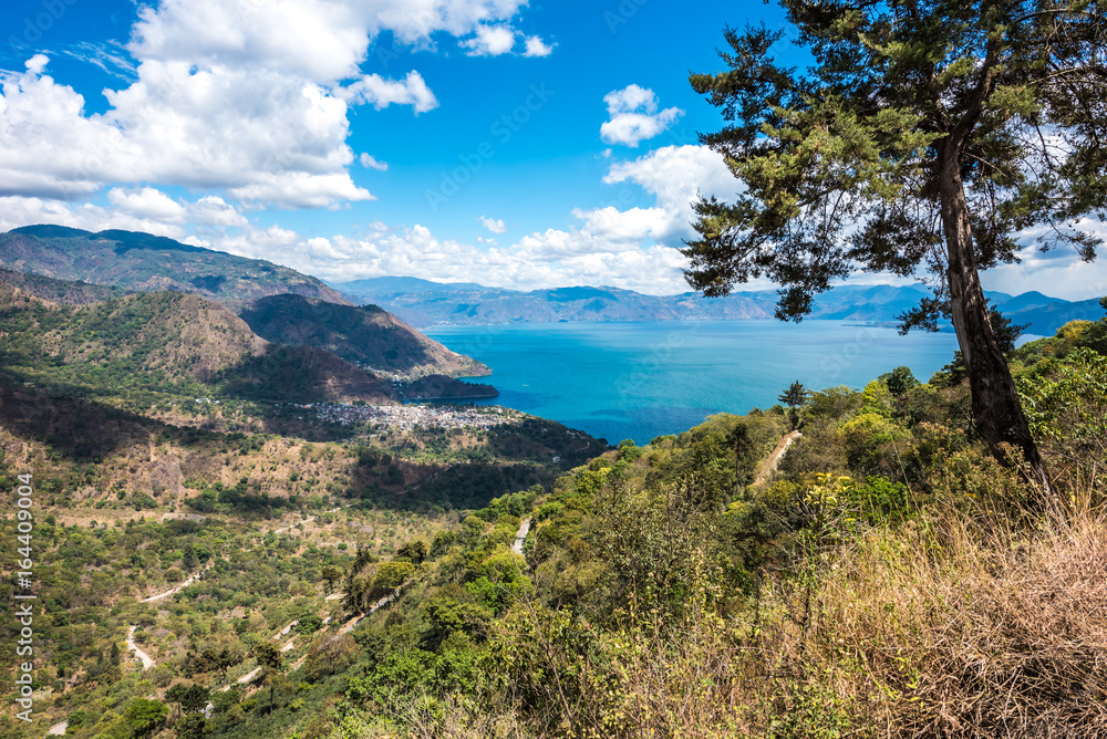 Viewpoint at lake Atitlan - view to the small villages San Marcos, Panajachel and San Marcos at the lake in the highlands of Guatemala